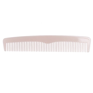 Close-up of fine-toothed light pink acetate hair comb with dense and smooth bristles