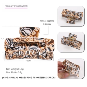 Tortoiseshell acetate hair claw clip with marble pattern and 7.5cm measurement guide