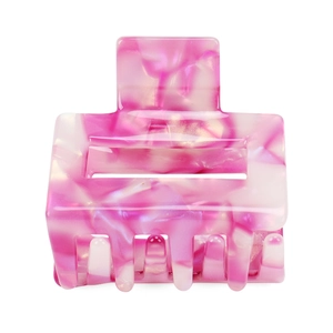 Detail of pink and white marble texture on a square acetate hair claw clip
