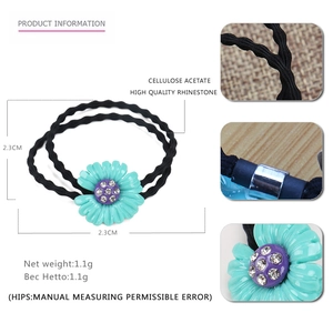 Elastico per capelli a margherita in acetato con petali turchesi e strass luccicanti