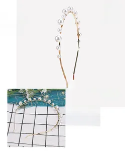 Detail view of pearl alloy headband with 15cm size and gradient pearl arrangement