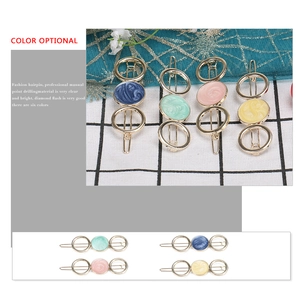 Chic hollow alloy hair clips with colorful marble resin inlay in a minimalist design