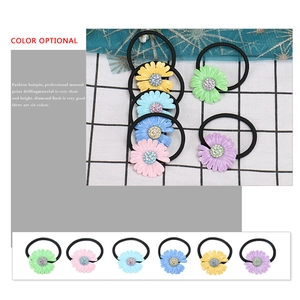 Set of colorful daisy hair ties with rhinestone center in six vibrant pastel colors