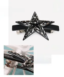 Detail showing high-quality cellulose acetate star hair clip with grey diamond rhinestones