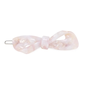 Close-up of pink marble acetate bow hair clip with visible metal fastener detail