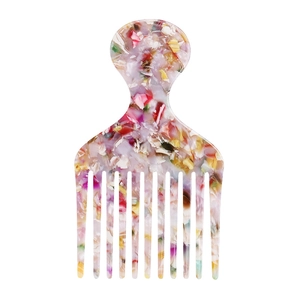 Detailed close-up of marble pattern acetate wide tooth hair comb for curly hair styling