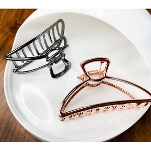 Elegant geometric metal hair claw clips in gunmetal and rose gold finishes