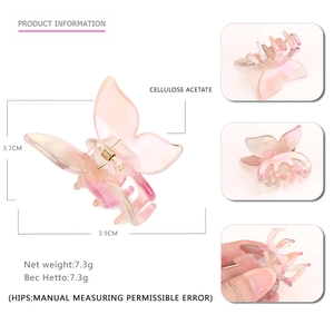 Pince à cheveux papillon en acétate rose dégradé avec dimensions affichées