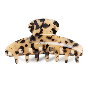 Large acetate leopard print hair claw clip for women on a white background