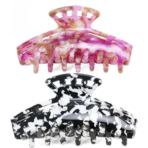 Classic large geometric acetate hair claw clips with marble pattern in pink and black white