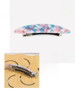 Macro detail of acrylic hairpin with marble texture showing size 9.4cm and weight 9.7g