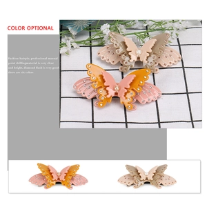 Bow hair clip with acetate layers, sparkling rhinestones and center pearl for women