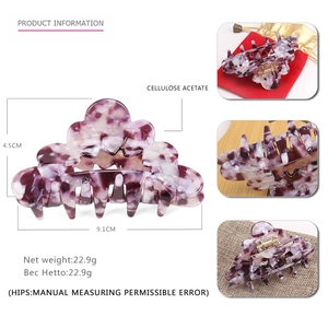 Detail showing 9.1cm x 4.5cm dimensions of purple marble acetate hair claw clip