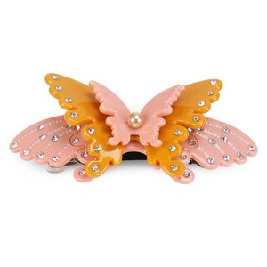 Elegant bow-shaped acetate hair clip with pink orange wings and white rhinestones