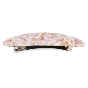 Detail of pink marble acrylic hair clip showing the metallic spring mechanism on white base