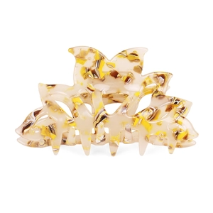 Detail of hollow out petal hair claw clip with beige and brown marble texture