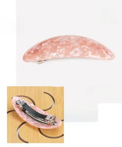 Pink marble acetate hair clip measuring 8.7x3.4cm with durable metal spring fastener