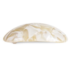 Detailed view of the marble pattern and metal spring clip on the arch hair clip