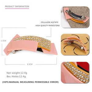 Pink and yellow acetate geometric hair clip with sparkling rhinestones and spring clamp