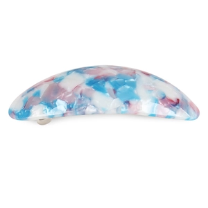 Close-up of marble pattern acetate arch hair clip with polished metal spring base