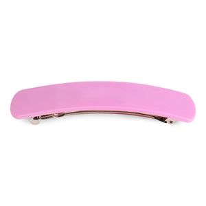 Detail of the pink 10.4cm acetate rectangle hair clip with glossy finish and metal spring