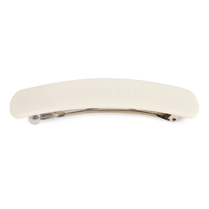 Detailed close-up of cream-white acetate hair clip with premium metal spring mechanism