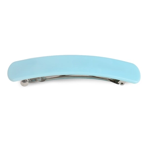 Detailed view of a light blue acetate hair clip with a silver metal spring clasp