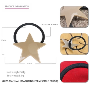 Detailed macro view of star shaped cellulose acetate hair tie with elastic cord texture