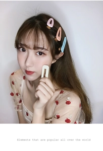 Close-up of macaron color hair clip set worn by a woman with geometric hollow design