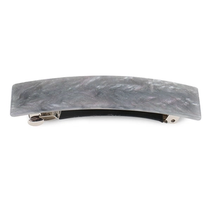Detail of grey marble acrylic hair clip with subtle glitter finish and silver metal spring