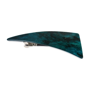 Detailed macro view of dark green marble patterned acrylic hair clip with silver metal back
