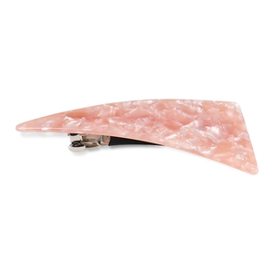 Detail of pink marble textured acrylic hair clip with silver metal spring buckle