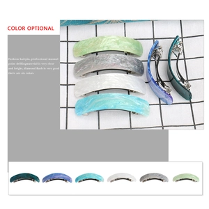 Set of 6 colorful acetate hair clips with marble patterns and metal spring fasteners