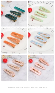 Detailed set of acetate hair clips in various geometric shapes and marble patterns