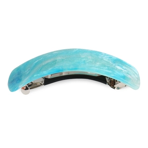 Close-up of light blue marble textured acrylic hair clip with pearl powder and silver base