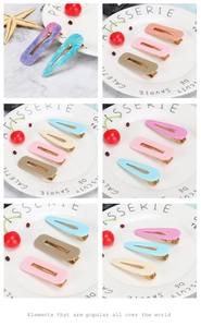 Macro view of colorful acetate rectangular and teardrop hair clips with gold alloy duckbill