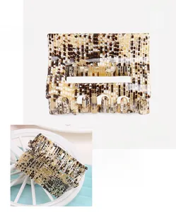 Detail of cellulose acetate square hair claw clip with mosaic pattern and non-slip teeth