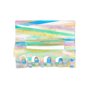 Detailed view of square hair claw clip featuring vibrant multi-color pearlescent stripes