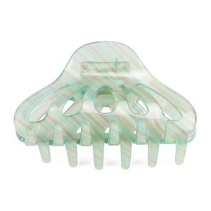 Macro detail of large translucent green acetate hair claw clip with orange iridescent stripes