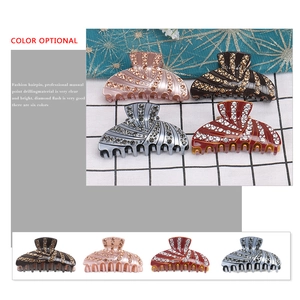 Elegant rhinestone claw clips in four assorted colors for various hair styling options