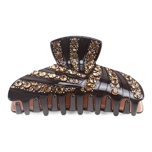Detail view of coffee acetate hair claw clip with sparkling amber Czech rhinestones