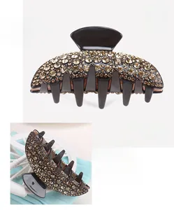 Macro shot of large acetate hair claw with champagne rhinestones measuring 9.5x4.5cm