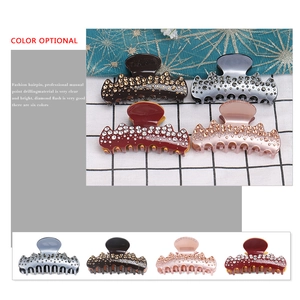 Elegant tortoiseshell hair claw clips with rhinestones in multiple vintage colors