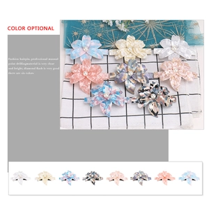Elegant acetate camellia hair clips with central pearl in eight various colors