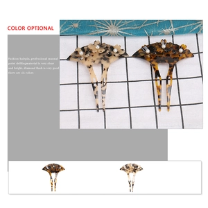 Elegant tortoiseshell acetate hair pin with floral design and pearl bead accent