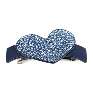 Detail of blue heart hair clip with blue rhinestones and metal spring mechanism