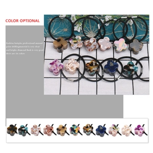 Minimalist clover acetate hair ties with tortoiseshell pattern and elastic band