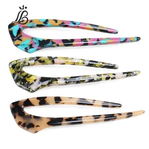 Acetate U-shaped hair pins set in floral, marble green, and tortoise shell patterns