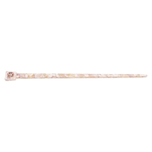 Detail of white acetate hair stick featuring a brown faceted gemstone and marble pattern