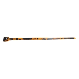 Detail view of a vintage tortoiseshell hair pin featuring a black faceted conical tip